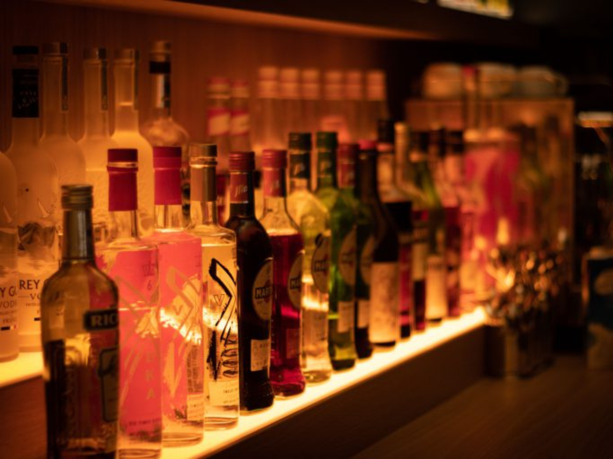 Picture of Bottles in a bar, lit from underneath